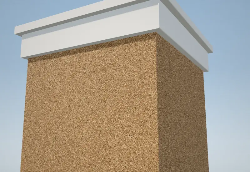 Gate pillar finished in Golden marble texture paint with a white cap