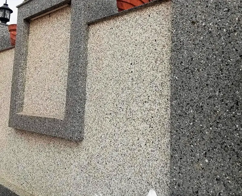 Boundary wall panel in light marble texture with a dark grey frame