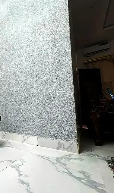 Grey marble texture wall in a hall