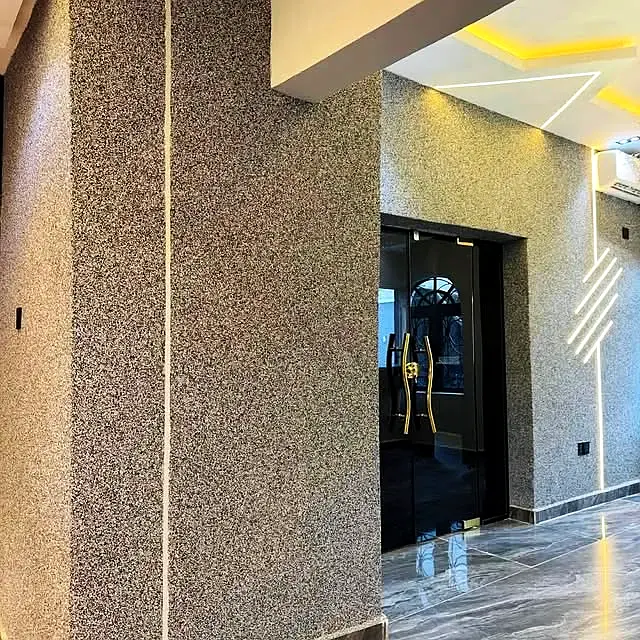 Lobby with grey marble texture walls