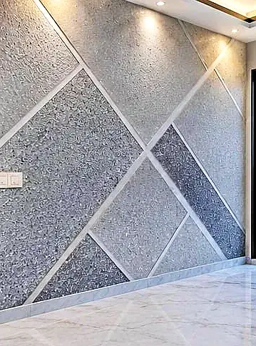 Feature wall with two-tone grey panels and steel lines