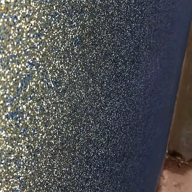 Close-up of grey marble texture catching the light