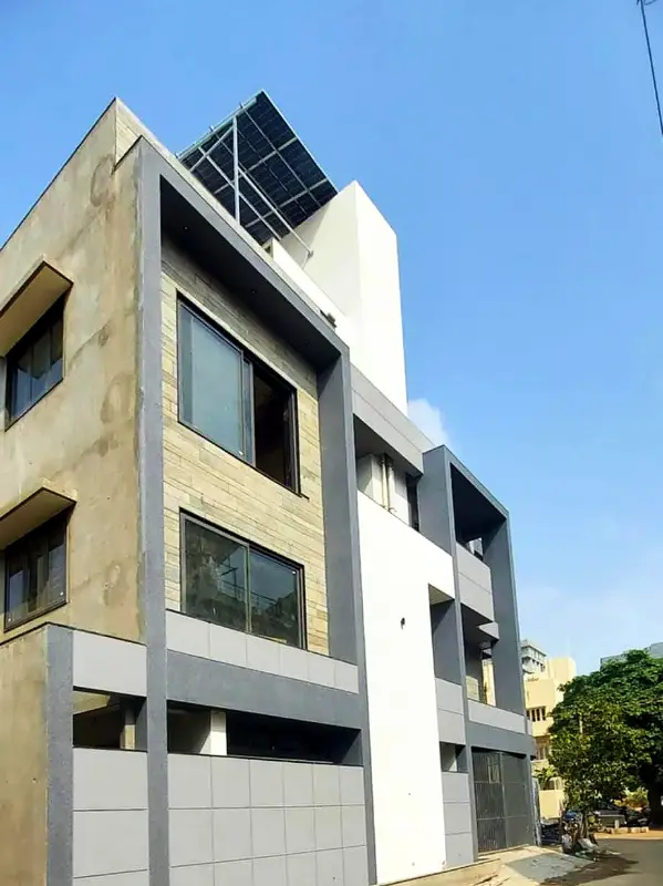 New building with grey texture on its frames and columns